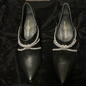 Gold and Rouge Leather Women's Black Pointed-Toe heels with Rhinestone Bow